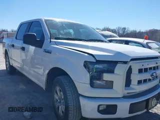 2015 Ford F-150 XLT with VIN 1FTEW1C84FFA95311, listed as a IAAI auction lot 41715478 with 240,405 mi miles and . Bid and sale history available at carsss.com. Image 1.