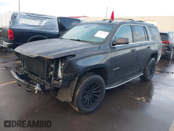2015 GMC Yukon SLT with VIN 1GKS2BKC7FR110106, listed as a IAAI auction lot 41702260 with 108,679 mi miles. Bid and sale history available at carsss.com. Image 19.