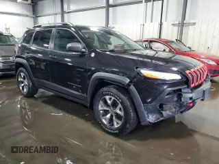 2014 Jeep Cherokee Trailhawk with VIN 1C4PJMBSXEW187981, listed as a Copart auction lot 56711885 with 157,317 mi miles and Salvage title. Bid and sale history available at DreamBid. Image 4.