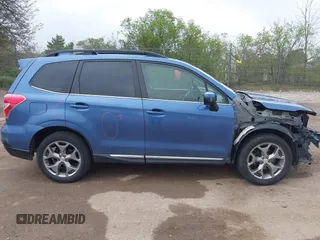 2016 Subaru Forester Touring z VIN JF2SJAVC7GH430720, wystawiony jako IAAI lot #42263999 z przebiegiem 132 853 mil mil oraz . Historia ofert i sprzedaży dostępna na DreamBid. Obrazek 13.