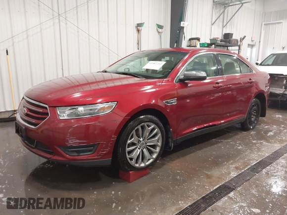 2013 Ford Taurus Limited with VIN 1FAHP2F82DG140741, listed as a IAAI auction lot 41882262 with 131,017 mi miles. Bid and sale history available at carsss.com. Image 2.