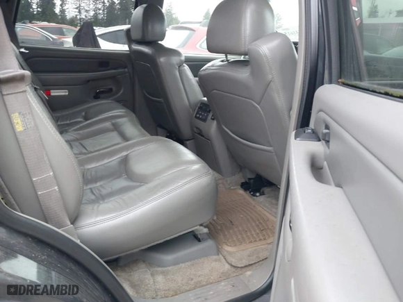2003 GMC Yukon Denali with VIN 1GKEK63U73J310098, listed as a IAAI auction lot 41831615 with 262,134 mi miles. Bid and sale history available at carsss.com. Image 8.