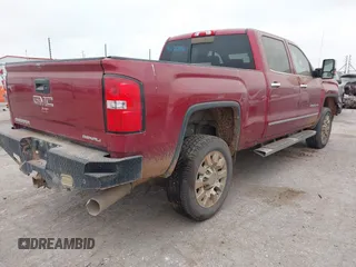 2019 GMC Sierra 2500HD Denali with VIN 1GT12SEYXKF218861, listed as a IAAI auction lot 41176336 with 130,225 mi miles. Bid and sale history available at carsss.com. Image 4.