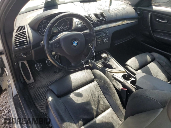 2012 BMW 1 Series 135i with VIN WBAUC9C52CVM12915, listed as a Copart auction lot 67145834 with 114,306 mi miles and Salvage title. Bid and sale history available at DreamBid. Image 8.
