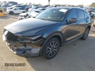 2018 Mazda CX-5 Grand Touring with VIN JM3KFBDM0J0405574, listed as a IAAI auction lot 41725319 with 44,380 mi miles. Bid and sale history available at carsss.com. Image 2.
