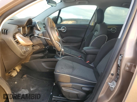 2018 FIAT 500X Pop with VIN ZFBCFXAB9JP634035, listed as a Copart auction lot 77771514 with 101,631 mi miles and Salvage title. Bid and sale history available at DreamBid. Image 7.