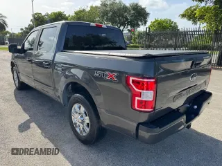 2019 Ford F-150 XL with VIN 1FTEW1CP1KKF22890, listed as a Copart auction lot 61813095 with 63,774 mi miles and Salvage title. Bid and sale history available at DreamBid. Image 2.