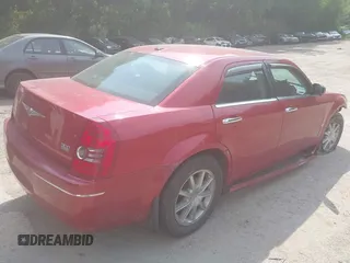 2010 Chrysler 300 Touring with VIN 2C3CK5CV0AH331268, listed as a IAAI auction lot 39666088 with 148,488 mi miles. Bid and sale history available at carsss.com. Image 4.