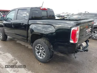 2022 GMC Canyon 4WD AT4 with VIN 1GTG6FEN0N1249453, listed as a IAAI auction lot 41513689 with 44,285 mi miles and . Bid and sale history available at carsss.com. Image 3.