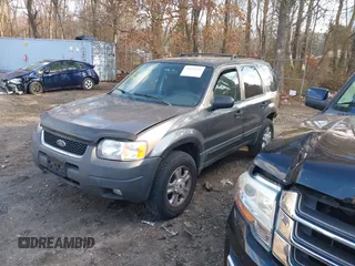 2003 Ford Escape XLT Popular 2 with VIN 1FMYU931X3KC87514, listed as a IAAI auction lot 41222513 with 267,880 mi miles. Bid and sale history available at carsss.com. Image 2.