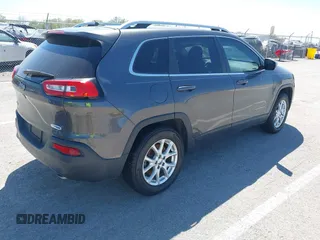 2014 Jeep Cherokee Latitude with VIN 1C4PJMCS2EW137767, listed as a IAAI auction lot 42052071 with 165,300 mi miles and . Bid and sale history available at DreamBid. Image 4.