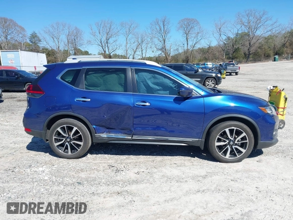 2019 Nissan Rogue SV with VIN 5N1AT2MT0KC783927, listed as a IAAI auction lot 41729241 with 77,890 mi miles and . Bid and sale history available at DreamBid. Image 13.