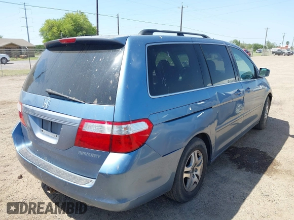 2005 Honda Odyssey EX-L with VIN 5FNRL387X5B083902, listed as a IAAI auction lot 42005085 with 249,861 mi miles. Bid and sale history available at carsss.com. Image 4.