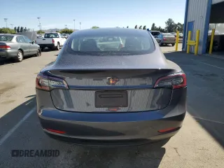 2023 Tesla Model 3 с VIN 5YJ3E1EA3PF405741, выставлен на аукционе Copart как лот 55800195 с пробегом 18 317 миль миль и Списание • Salvage title. История ставок и продаж доступна на DreamBid. Изображение 6.