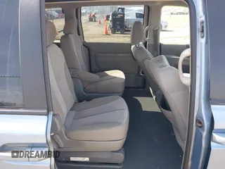 2011 Kia Sedona LX with VIN KNDMG4C74B6368551, listed as a IAAI auction lot 42022483 with 172,495 mi miles. Bid and sale history available at carsss.com. Image 8.