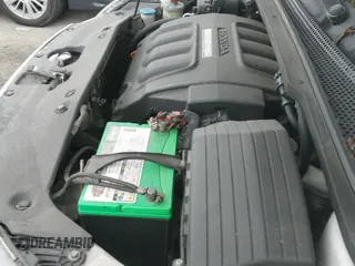 2005 Honda Odyssey Touring with VIN 5FNRL38805B001863, listed as a IAAI auction lot 43535405 with 214,381 mi miles and . Bid and sale history available at DreamBid. Image 12.