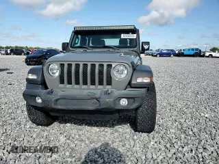 2019 Jeep Wrangler Unlimited Sport with VIN 1C4HJXDG6KW690966, listed as a Copart auction lot 62450355 with 55,576 mi miles and Salvage title. Bid and sale history available at DreamBid. Image 13.