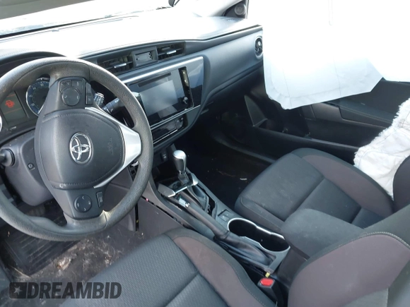 2019 Toyota Corolla L with VIN 5YFBURHEXKP934032, listed as a IAAI auction lot 41247557 with 95,560 mi miles. Bid and sale history available at carsss.com. Image 5.