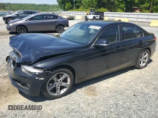 2015 BMW 3 Series 320i xDrive with VIN WBA3C3C5XFK202500, listed as a Copart auction lot 54671075 with 111,168 mi miles and Salvage title. Bid and sale history available at DreamBid. Image 1.
