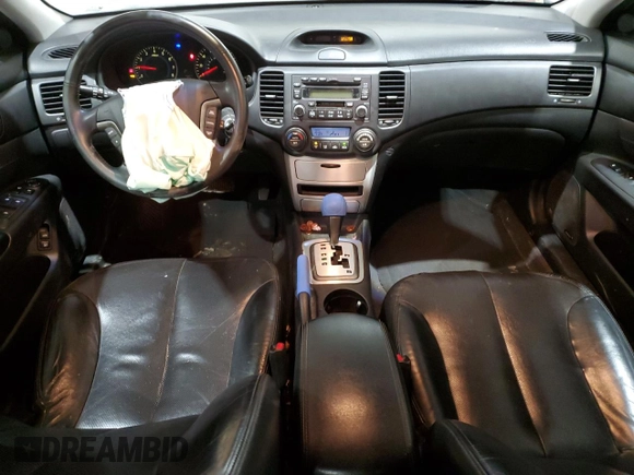 2007 Kia Optima EX with VIN KNAGE124275127221, listed as a Copart auction lot 46538705 with 229,606 mi miles and Salvage Title. Bid and sale history available at carsss.com. Image 8.