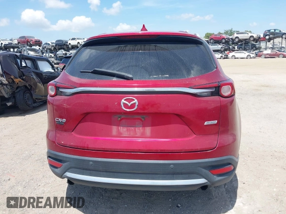 2019 Mazda CX-9 Grand Touring z VIN JM3TCADY5K0302436, wystawiony jako IAAI lot #42323545 z przebiegiem Nie podano mil oraz . Historia ofert i sprzedaży dostępna na DreamBid. Obrazek 16.