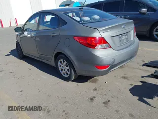 2013 Hyundai Accent GLS z VIN KMHCT4AE1DU542207, wystawiony jako IAAI lot #42174737 z przebiegiem 143 757 mil mil oraz . Historia ofert i sprzedaży dostępna na DreamBid. Obrazek 3.