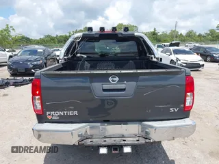 2014 Nissan Frontier SV z VIN 1N6AD0ER9EN751010, wystawiony jako IAAI lot #42326309 z przebiegiem 199 871 mil mil oraz . Historia ofert i sprzedaży dostępna na DreamBid. Obrazek 16.