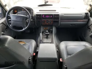 1997 Land Rover Discovery SD with VIN SALJY1246VA546265, listed as a Copart auction lot 82641074 with 150,444 mi miles and Salvage Title. Bid and sale history available at carsss.com. Image 8.