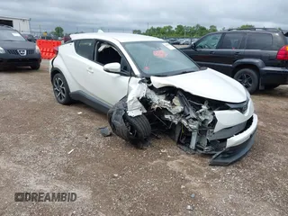 2019 Toyota C-HR XLE with VIN JTNKHMBX4K1017377, listed as a IAAI auction lot 40049656 with 71,308 mi miles. Bid and sale history available at carsss.com. Image 1.