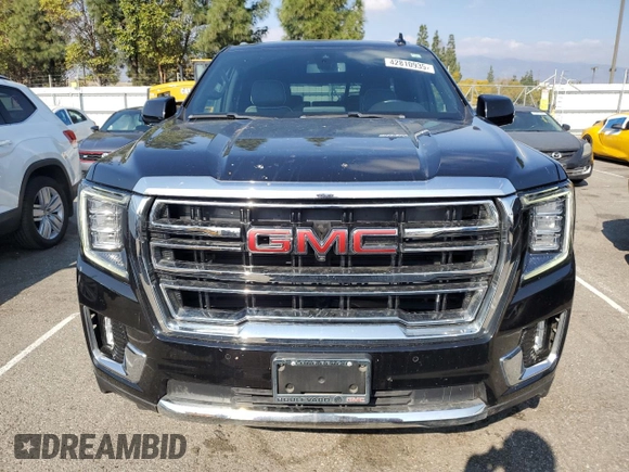 2021 GMC Yukon SLT with VIN 1GKS1BKD0MR395515, listed as a Copart auction lot 42810935 with 54,071 mi miles and Salvage Title. Bid and sale history available at carsss.com. Image 5.