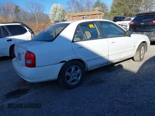 2001 Mazda Protege LX with VIN JM1BJ225710406286, listed as a IAAI auction lot 41887127 with Not Provided miles and . Bid and sale history available at DreamBid. Image 4.