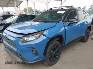 2023 Toyota RAV4 Hybrid XSE with VIN 2T3E6RFV4PW039496, listed as a IAAI auction lot 42488695 with 13,533 mi miles and . Bid and sale history available at DreamBid. Image 2.