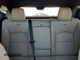 2024 Cadillac XT4 FWD Premium Luxury z VIN 1GYFZCR43RF241465, wystawiony jako Copart lot #49428795 z przebiegiem Nie podano mil oraz Szkoda całkowita • Salvage title. Historia ofert i sprzedaży dostępna na DreamBid. Obrazek 10.