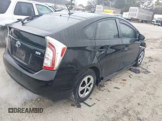 2015 Toyota Prius Four with VIN JTDKN3DU1F1996520, listed as a IAAI auction lot 41564249 with 194,433 mi miles and . Bid and sale history available at DreamBid. Image 4.