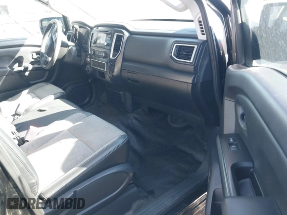 2018 Nissan Titan SV z VIN 1N6AA1EJ0JN518958, wystawiony jako IAAI lot #42505721 z przebiegiem 122 487 mil mil oraz . Historia ofert i sprzedaży dostępna na DreamBid. Obrazek 5.