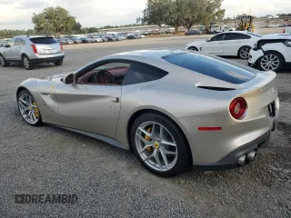 2014 Ferrari F12 z VIN ZFF74UFAXE0202704, wystawiony jako Copart lot #73676684 z przebiegiem Nie podano mil oraz Szkody całkowita. Historia ofert i sprzedaży dostępna na DreamBid. Obrazek 2.