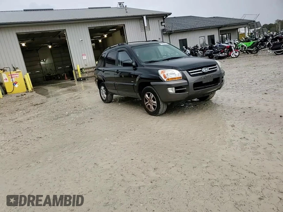2005 Kia Sportage LX with VIN KNDJE723X57131795, listed as a Copart auction lot 79035214 with 146,746 mi miles and Salvage Title. Bid and sale history available at carsss.com. Image 12.