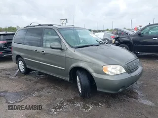 2005 Kia Sedona LX with VIN KNDUP132656734193, listed as a IAAI auction lot 41892342 with 91,768 mi miles. Bid and sale history available at carsss.com. Image 1.