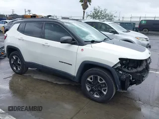 2018 Jeep Compass Trailhawk with VIN 3C4NJDDB0JT306898, listed as a IAAI auction lot 41798954 with 75,852 mi miles and . Bid and sale history available at carsss.com. Image 1.