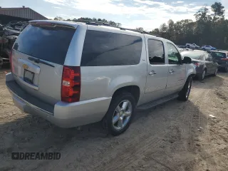 2014 Chevrolet Suburban LTZ with VIN 1GNSCKE02ER141764, listed as a Copart auction lot 85005524 with 234,019 mi miles and Salvage title. Bid and sale history available at DreamBid. Image 3.