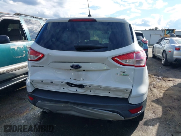 2014 Ford Escape SE with VIN 1FMCU0GX0EUE35004, listed as a IAAI auction lot 40811631 with 126,464 mi miles. Bid and sale history available at carsss.com. Image 16.