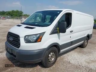 2015 Ford Transit Cargo z VIN 1FTNE1ZM4FKB15801, wystawiony jako IAAI lot #42674219 z przebiegiem 228 634 mil mil oraz . Historia ofert i sprzedaży dostępna na DreamBid. Obrazek 21.