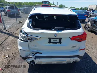 2019 BMW X3 xDrive30i z VIN 5UXTR9C5XKLD90591, wystawiony jako IAAI lot #42296306 z przebiegiem 100 416 mil mil oraz . Historia ofert i sprzedaży dostępna na DreamBid. Obrazek 16.