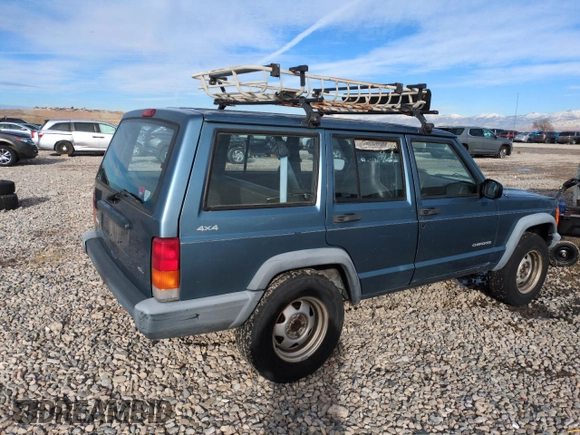 1999 Jeep Cherokee SE with VIN 1J4FF28S5XL646812, listed as a Copart auction lot 87951115 with 230,161 mi miles and Clean title. Bid and sale history available at DreamBid. Image 3.