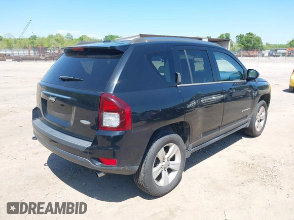 2014 Jeep Compass Latitude with VIN 1C4NJDEB9ED558420, listed as a IAAI auction lot 39277541 with 109,213 mi miles and . Bid and sale history available at carsss.com. Image 4.