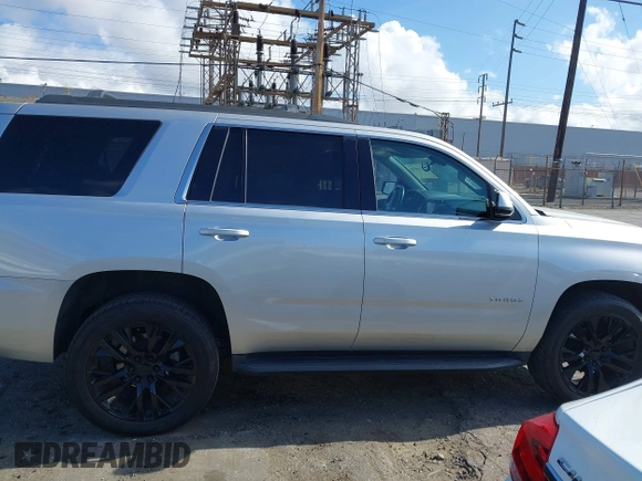 2020 Chevrolet Tahoe LS with VIN 1GNSCAKC2LR227856, listed as a IAAI auction lot 42246510 with 55,132 mi miles and . Bid and sale history available at DreamBid. Image 14.