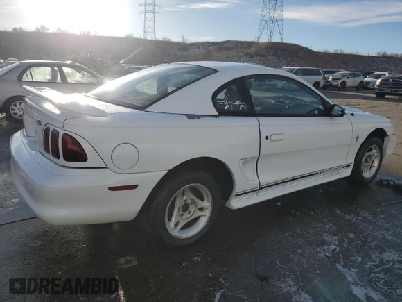 1997 Ford Mustang with VIN 1FALP4045VF120213, listed as a Copart auction lot 85335614 with 71,225 mi miles and Salvage Title. Bid and sale history available at carsss.com. Image 3.