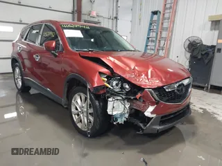 2013 Mazda CX-5 Grand Touring with VIN JM3KE2DE3D0120609, listed as a IAAI auction lot 41527942 with 215,176 mi miles. Bid and sale history available at carsss.com. Image 1.