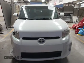 2014 Scion xB with VIN JTLZE4FE1EJ060281, listed as a IAAI auction lot 41477386 with 61,423 mi miles. Bid and sale history available at carsss.com. Image 12.
