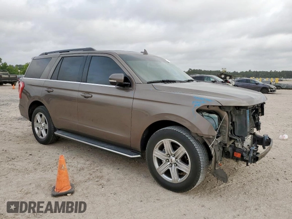 2018 Ford Expedition XLT with VIN 1FMJU1HT8JEA70326, listed as a Copart auction lot 57042785 with 123,249 mi miles and Salvage title. Bid and sale history available at DreamBid. Image 4.